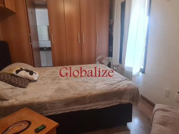 Imagem Apartamento de 2 dormitórios com sacada na Vila Mathias em Santos por $ 450.000,00 mil