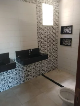 Imagem Casa à Venda no Bairro Farolândia - 4 Quartos, 2 Vagas de Garagem
