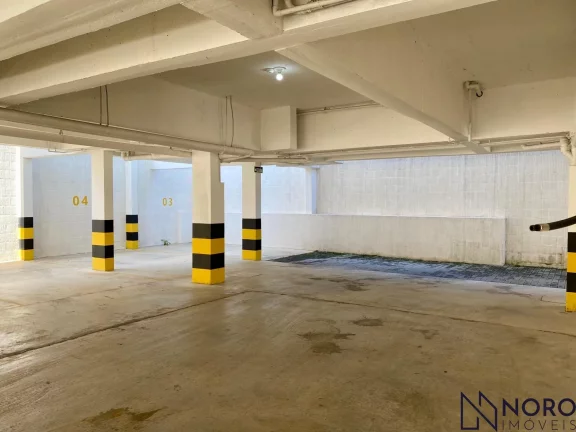 Apartamento 2 dormitórios, sacada com churrasqueira, 1 vaga de garagem no Bairro