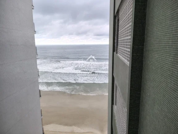 Imagem Apartamento frente mar de 2 quartos com suíte, 2 salas e vaga de garagem nas Pitangueiras, Guarujá-SP: Imperdível oportunidade!