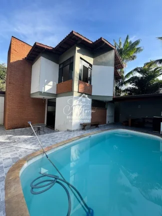 Imagem Casa Jardim Virginia com 4 quartos, 4 suítes, 3 salas e 8 vagas de garagem no Guarujá-SP, bairro Loteamento João Batista Julião!