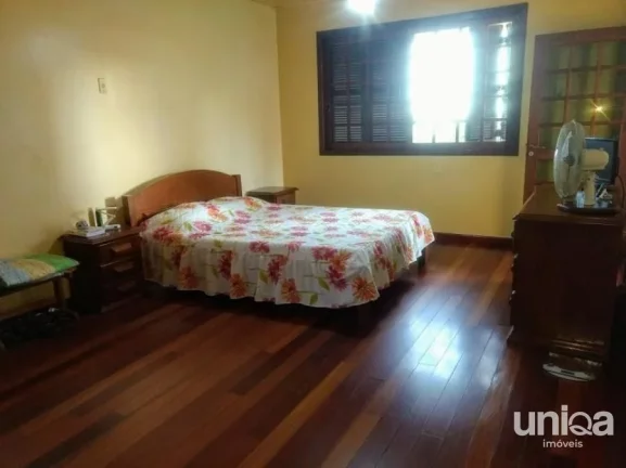 Imagem Casa 4 dormitórios (2 suítes), banheira de hidro, piscina, garagem