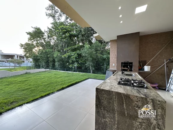 Imagem Casa Linear com 4 Suítes e Amplo Quintal no Condomínio Riviera Park