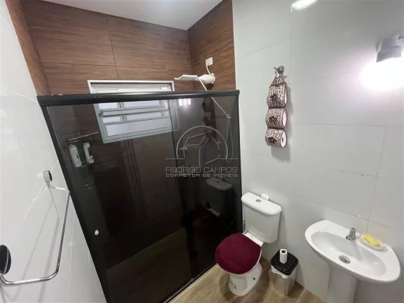 Imagem Casa Geminada Térrea com Piscina e 3 Quartos no Tupi, Praia Grande