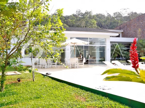 Imagem Oásis de Luxo: Casa térrea com piscina, sauna e píer privativo à venda no condomínio Marina Guarujá