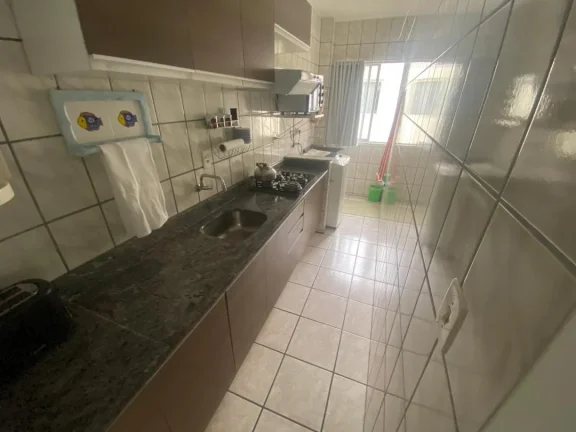 Imagem Apartamento mobiliado com churrasqueira a carvão e varanda na quadra mar na praia de Gravatá em Navegantes a venda pela Imobiliária Adriano Carpes