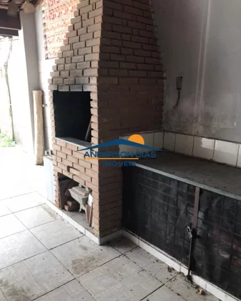 Imagem Casa com 2 dormitórios à venda, 120 m² por R$ 330.000 - Golfinho - Caraguatatuba/SP