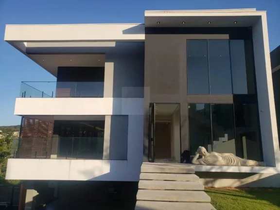 Imagem Casa em condomínio, com 6 quartos, piscina de borda infinita, automatizada, vista para mata