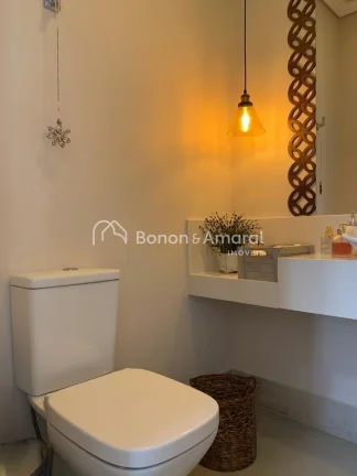 Imagem Casa térrea com sala de estar, sala de tv, lavabo, sala de jantar integrada à cozinha planejada e ...