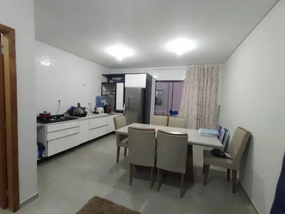 Imagem Terreno com 2 Sobrados, meio lote, com suíte