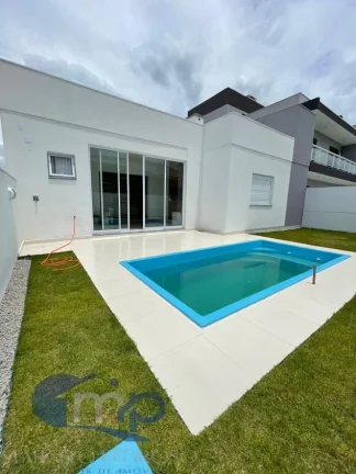 Imagem Casa á venda com 3 dormitórios na praia Bela Torres em Passo de Torres/SC