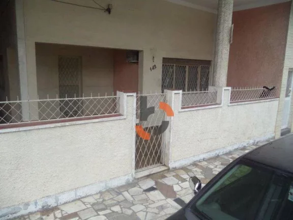 Imagem Oportunidade no Centro de NI: Casa Térrea com 2 Vagas a Pé do Calçadão