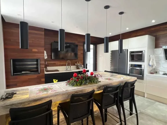 Imagem Casa de alto padrão em condomínio com 4 suítes em Camboriú/SC