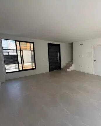Imagem Geminado com 3 suítes e 2 vagas de garagem no bairro Itacolomi em Balneário Piçarras/SC