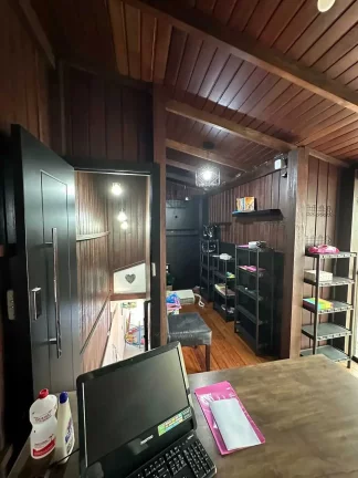 Imagem Casa com 3 dormitórios sendo 1 suíte e 2 vagas de garagem em Itapema/SC