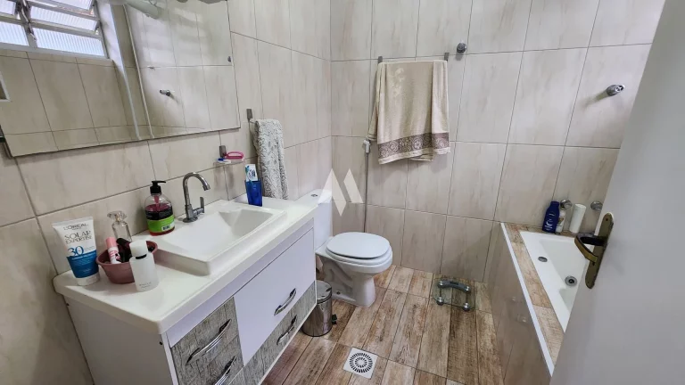 Imagem Venda de Casa/Sobrado no Embaré, Santos - Oportunidade Única em Localização Privilegiada
