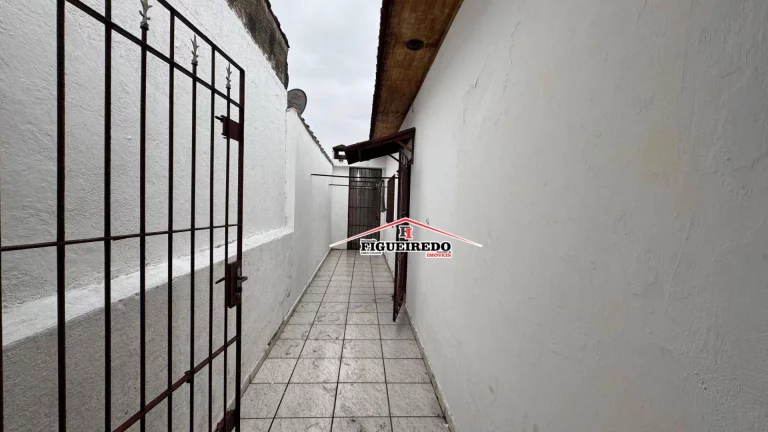 Imagem Casa à venda, 90 m² por R$ 395.000,00 - Maracanã - Praia Grande/SP