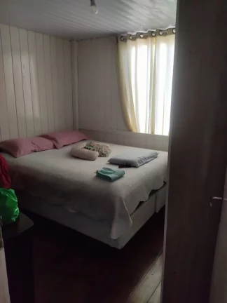 Imagem Terreno com uma casa mista no paranaguamirim