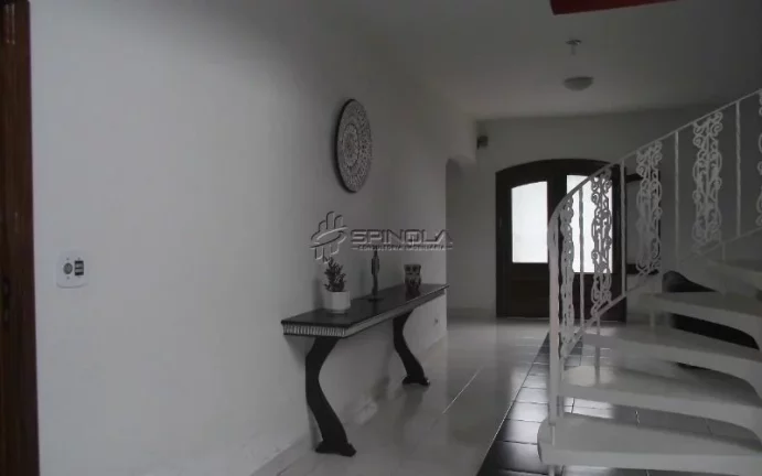 Imagem Sobrado com 4 dormitórios à venda, 710 m² por R$ 1.500.000,00 - Solemar - Praia Grande/SP