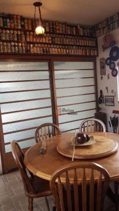 Imagem Sobrado com 3 dormitórios à venda, 206 m² por R$ 1.150.000 - J Jaguaribe - Campos do Jordão/SP