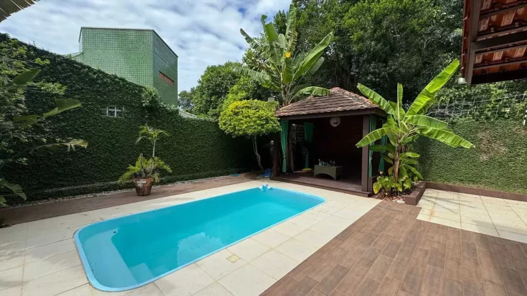 Imagem Casa com 2 lotes, 4 suítes e 2 vagas de garagem em condomínio Ariribá – Balneário Camboriú / SC
