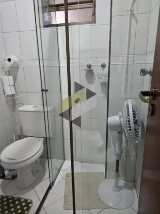 Imagem Sobrado Geminado para Venda em Santos, Embaré, 3 dormitórios, 1 suíte, 4 banheiros, 3 vagas