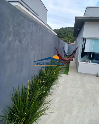 Imagem Casa com 2 dormitórios à venda, 65 m² por R$ 550.000 - Massaguaçu - Caraguatatuba/SP