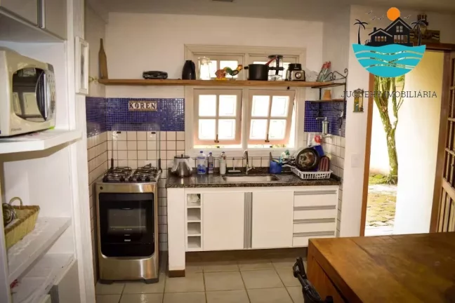 Imagem Casa em condomínio para venda em Juquehy com 3 dormitórios, 1 suíte, 50 metros da praia e 160m² de área construída | Juquehy Imobiliária