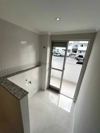 Imagem Apartamento reformado com 2 dormitórios e 1 vaga em condomínio - Camboriú/SC