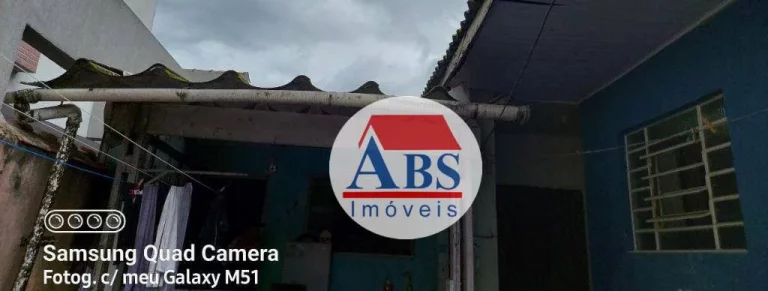 Imagem casa com duas lojas e uma edícula