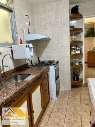 Imagem Vendo apartamento no Centro com 2 quartos e vaga de garagem