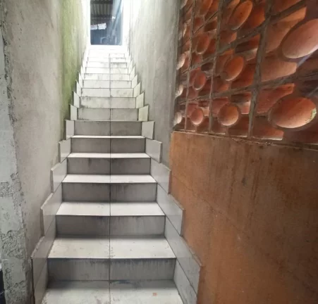 Imagem Casa sobreposta alta com 1 dormitório à venda, 90 m² por R$ 150.000 - Vila Costa Muniz - Cubatão/SP