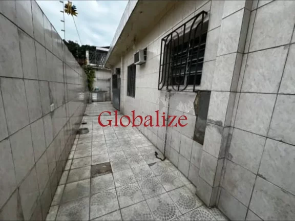 Imagem Casa à venda com 275m², 4 quartos, 4 vagas, piscina, churrasqueira por R$ 609.000,00 no Bom Retiro - Santos