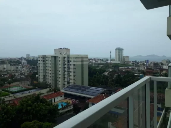 Imagem Apartamento à venda na Glória, Macaé-RJ: 2 quartos, 1 suíte, 1 sala, 2 banheiros, 1 vaga. Espaço ideal de 60m²!