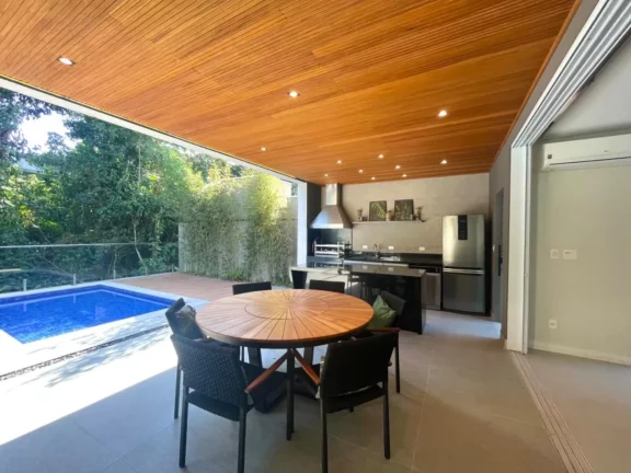 Imagem Casa de luxo à venda em Riviera de São Lourenço Módulo 24: 5 quartos, 5 suítes, 3 salas, 6 vagas de garagem, 400m².