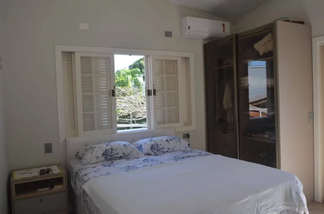 Imagem Casa de 5 suítes à venda na Riviera de São Lourenço, módulo 21.