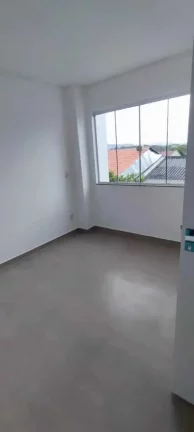 Imagem Casa com 2 Dormitórios sendo 1 suíte e 1 vaga na Garagem em Navegantes.