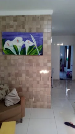 Casa à venda no Conjunto Marcos Freire 3 com 2 quartos, suíte e 2 vagas de garagem.