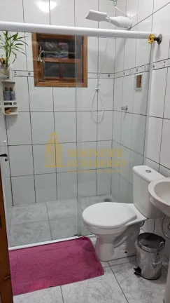 Imagem Casa Elegante com 4 Dormitórios a 700 metros da praia de Massaguaçu.