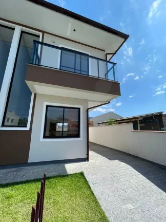 Imagem Sobrado com 2 suítes e 2 vagas de garagem – Loteamento Bela Vista | Palhoça/SC