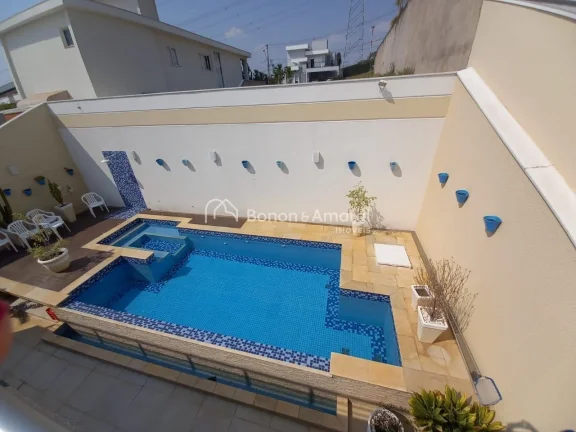 Imagem Lindo sobrado com 4 suítes, sendo uma master com jardim de inverno, outra no térreo, varanda. Espa...