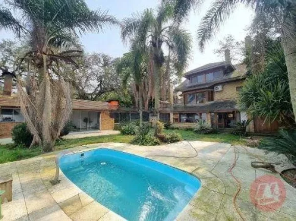 Imagem Casa com 3 dormitórios para alugar, 500 m² por R$ 19.884,00/mês - Pedra Redonda - Porto Alegre/RS