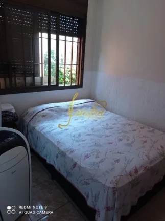 Imagem Casa composta por 03 dormitórios um sendo suíte