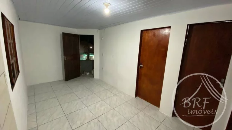 Imagem Vendo terreno com três casas e uma Kitnet em Serraria, São José SC
