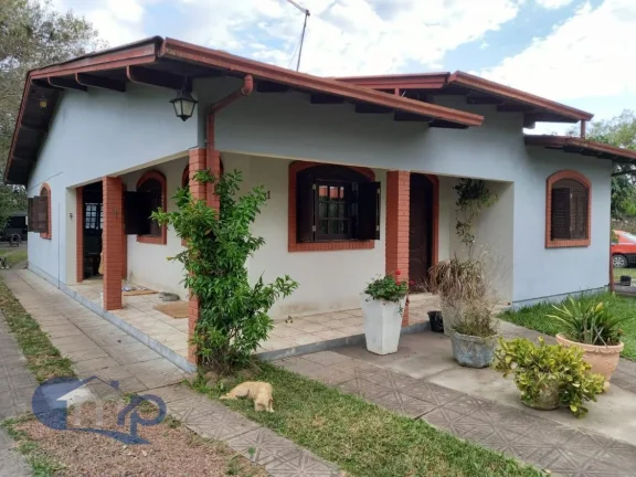 Imagem Casa à venda com 3 dormitórios na Itapeva Sul em Torres/RS