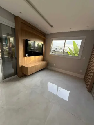Imagem Casa em condomínio com 4 suítes e 2 vagas de garagem