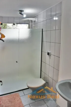 Imagem Casa com Piscina e 3 quartos