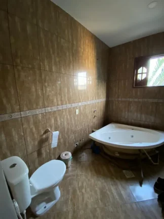 Imagem Casa em Condomínio para Venda em Itaboraí, Centro (Manilha), 4 dormitórios, 1 suíte, 3 banheiros, 3 vagas
