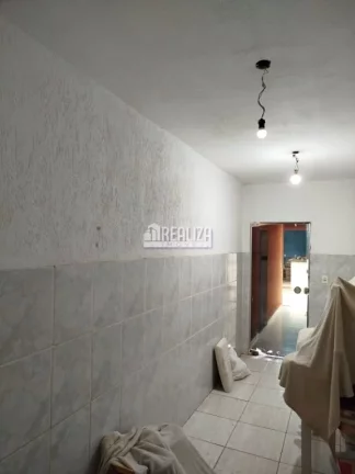 Imagem Casa à venda no Jardim Elza Amuí I, Uberaba: 2 dormitórios com suíte e varanda gourmet