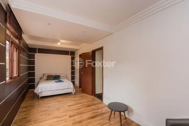Imagem Casa em Condomínio 3 dorms à venda Avenida Vicente Monteggia, Cavalhada - Porto Alegre